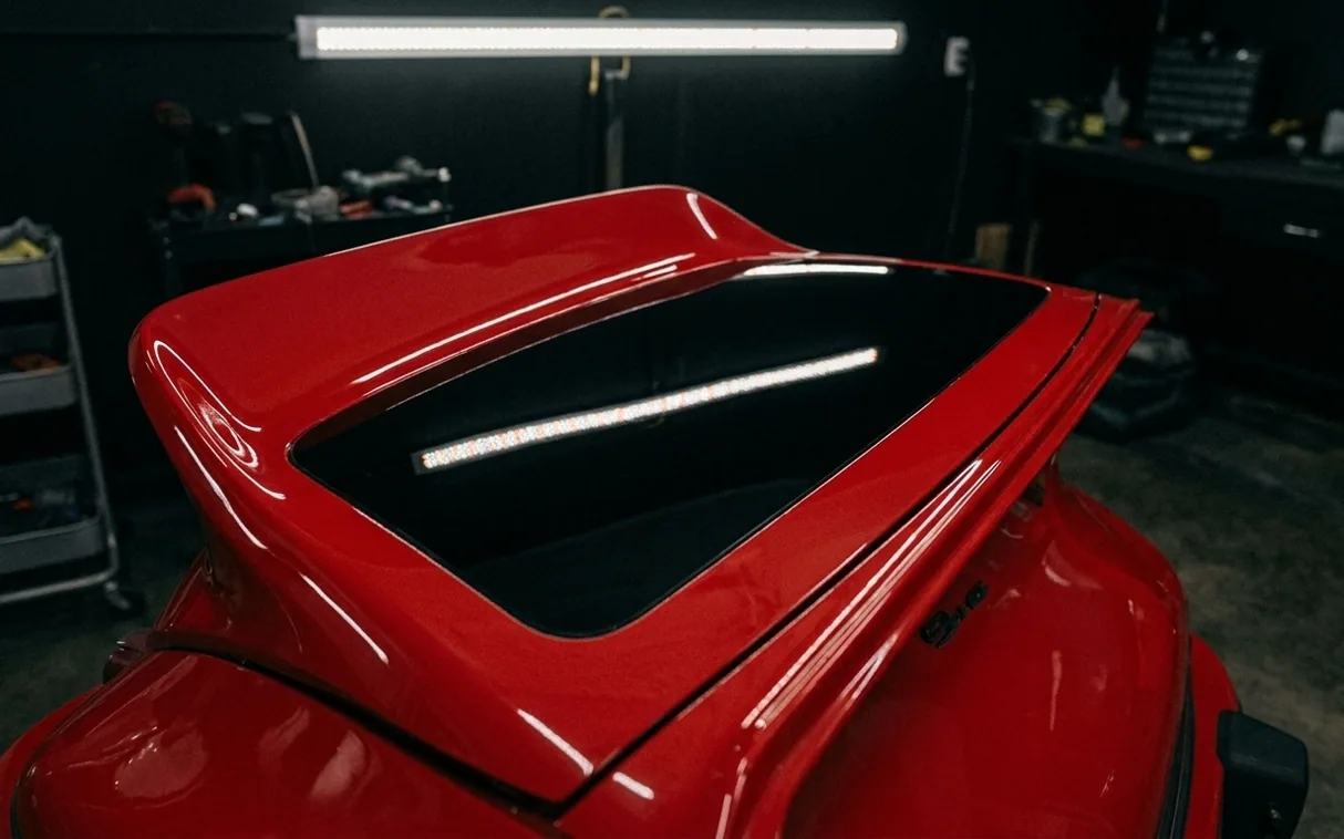 The same spoiler restored to deep red gloss