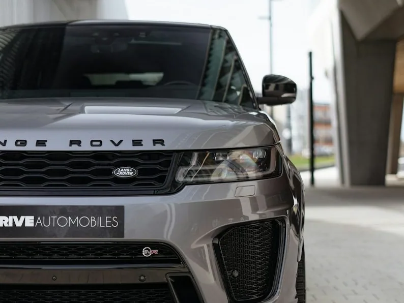 Range Rover Sport — the named car, dark and glossy