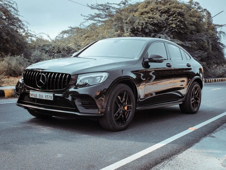 Mercedes GLC — the named car, dark and glossy