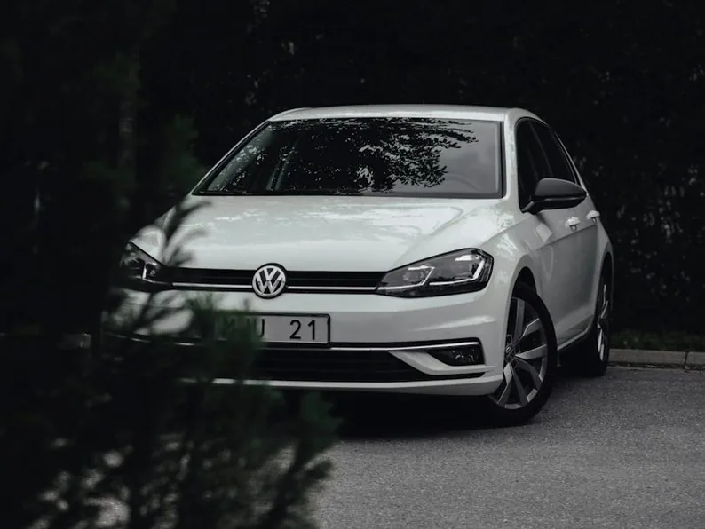 VW Golf R — the named car, dark and glossy